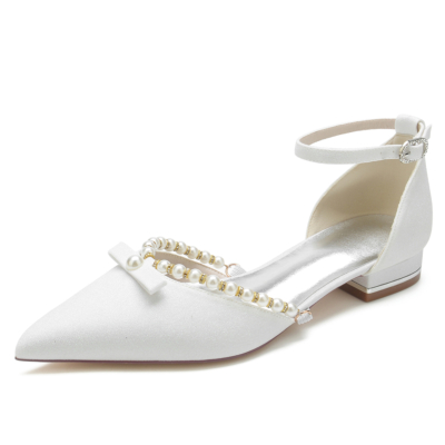 Zapatos planos con tira en el tobillo y puntera en punta con lazo de brillo blanco y perla