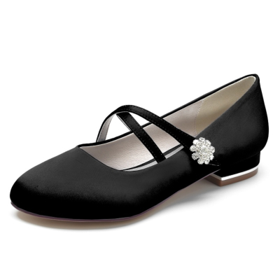Zapatos planos negros con correa cruzada y punta redonda para mujer
